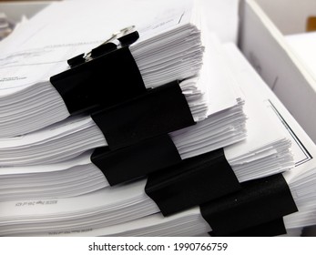 Stacks Of Documents With Black Clips In Box For Filing Business Legal Education