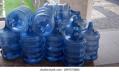 Stacks Of Empty Plastic Bottle Or Gallon Of Purified Drinking Water To Refill