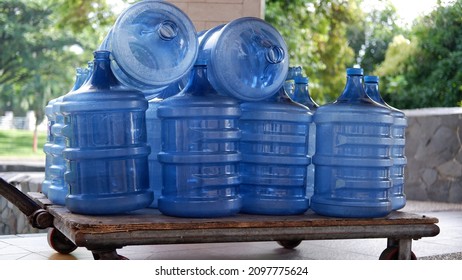 Stacks Of Empty Plastic Bottle Or Gallon Of Purified Drinking Water To Refill