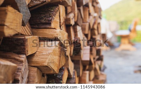 
Stacks of Firewood. Preparation of firewood for the winter.
Pile of Firewood.Firewood background