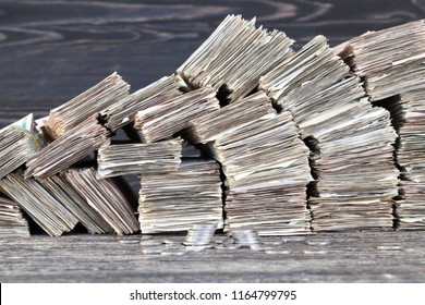 Stacks Of Folded Paper Money Worn And Worn Out, Ready For Disposal And Destruction