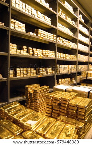  stacks of  gold bars in storage in a bank vault                            
