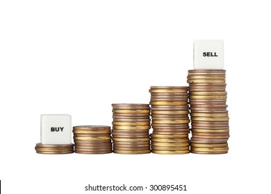 Stacks of increasing amount of coins with Buy Low and Sell High signs isolated on white background 