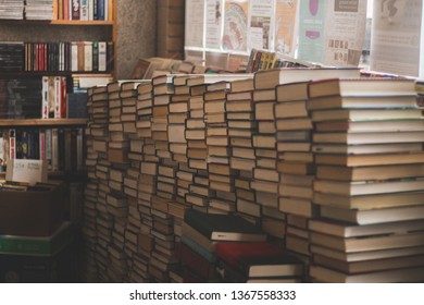 Stacks Of Old Books In A Small Bookstore. 