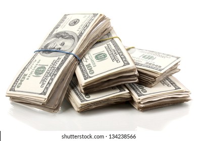 Stacks of one hundred dollars banknotes close-up isolated on white - Shutterstock ID 134238566