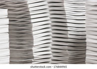 Stacks of paper that has been collated. - Shutterstock ID 176844965