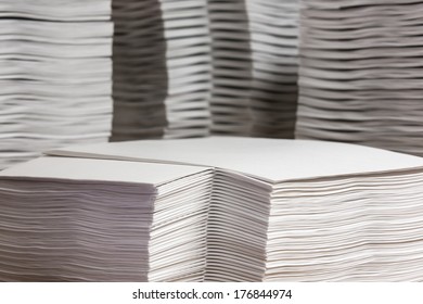 Stacks of paper that has been collated. - Shutterstock ID 176844974