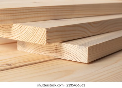 Stacks Of Pine Wood Planks. Natural Rough Wooden Boards Boards, Lumber, Industrial Wood, Timber.