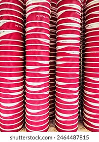 Stacks of red, throwaway cups