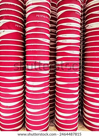 Stacks of red, throwaway cups