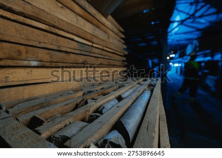 Stacks of rock core samples at geological drilling of mining industry.