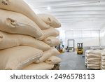 Stacks with sacks and bags with packages  full of grain ready to be transported. Images from inside an industrial grain mill.