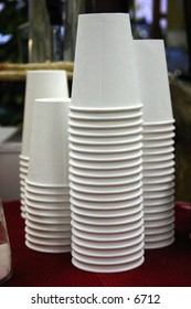 stacks of white disposable paper cups