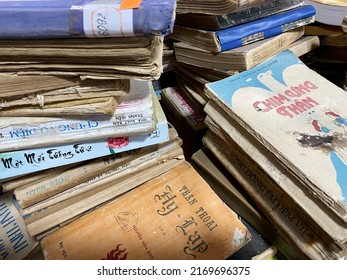 Stacks Of Worn-out Books For Sale At A Used Book Fair In Vietnam, May 2022