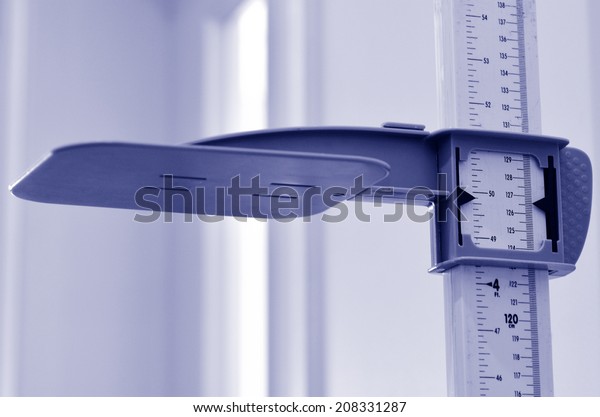 Stadiometer -\
human height measuring devices. close up. Concept photo of medical,\
lifestyle, height and\
growth.