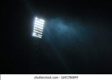 stadium light in foggy weather at night