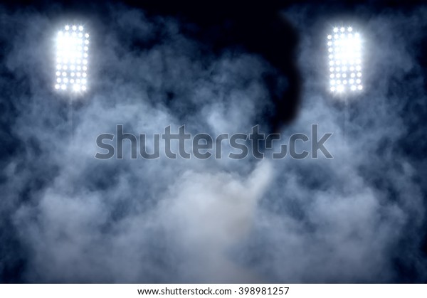 stadium lights and\
smoke
