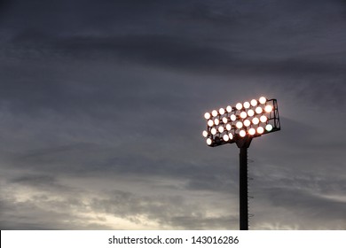 Stadium Lights Turn On At Twilight Time