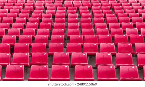 Stadium seat rows, sports background in arena for football or soccer game, public theatre, concert hall amphitheater with empty red spectator audience chair for outdoor sporty recreation - Powered by Shutterstock