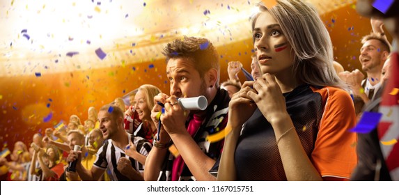 Stadium Soccer Fans Emotions Portrait In Yellow Toning