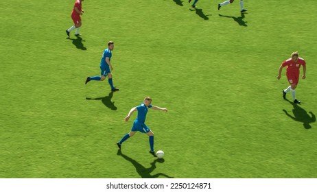 Stadium Soccer Football Match International Championship. Blue Team Attacks, Plays in Pass, Dribbling. World Tournament. Live Sport Broadcast Channel Television Concept. High Angle Shot. - Powered by Shutterstock