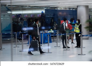 A Staff Checking Traveler Body Temperature In Donmuang Airport,Bangkok, Thailand, March 18 ,2019