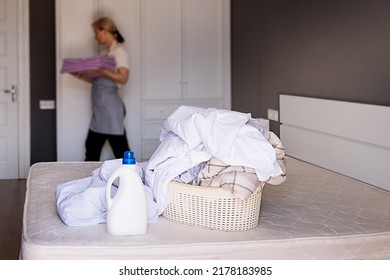 Staff Cleans The Hotel Room, Changes Bed Linen. Liquid Laundry Detergent Mockup