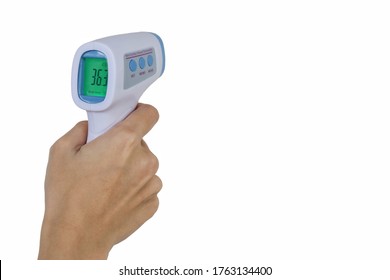 Staff Hand Hold Non Contact Infrared Thermometer On Pure Isolated White Background With Copy Space. Concept Of Protect Covid Flu. Control People To Enter Shopping Mall, Supermarket, Canteen, Office.