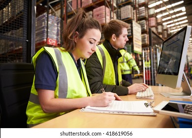 Staff managing warehouse logistics in an on-site office