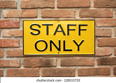 Staff Only Sign On Brick Wall