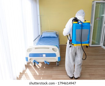 Staff Protective Suit PPE And Mask.Cleaning And Disinfection In A Room Of Hospital Amid The Coronavirus Epidemic Professional Teams For Disinfection Efforts Infection Prevention Control Of Epidemic.