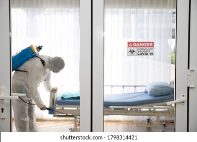 Staff Protective Suit PPE And Mask.Cleaning And Disinfection In A Room Of Hospital Amid The Coronavirus Epidemic Professional Teams For Disinfection Efforts Infection Prevention Control Of Epidemic.