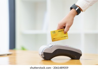 Staff Using Edc Credit Card Reader