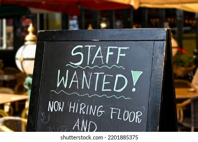 Staff Wanted Recruitment Sign Outside A Restaurant In Europe