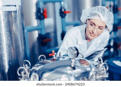 staff work in science medical lab factory check record pressure tank happy working - Powered by Shutterstock