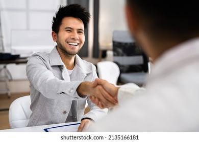 Staffing Interview In Office. Law Recruiter Meeting Handshake - Powered by Shutterstock