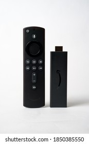 Stafford / United Kingdom - November 8 2020: Amazon Fire TV Stick 4K Ultra HD With Alexa Voice Remote. Product Shot Isolated On White.