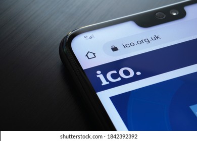 Stafford / United Kingdom - October 27, 2020: The Information Commissioner's Office ICO website seen on the smartphone corner. The United kingdom watchdog protects information rights, data privacy.