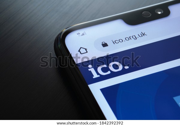 Stafford / United Kingdom - October 27, 2020:\
The Information Commissioner\'s Office ICO website seen on the\
smartphone corner. The United kingdom watchdog protects information\
rights, data privacy.