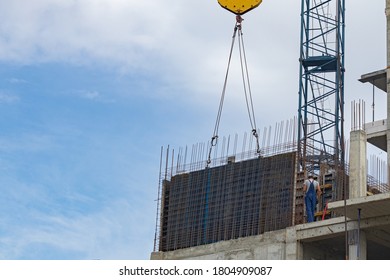 Stage In The Construction Of A Multi-Storey Building. Forming The Wall Using The Sliding Formwork. The Crane Holds The Formwork Shield