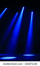 stage lighting effect in the darkness, closeup of photo