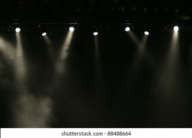 Stage Lights Against Dark Background