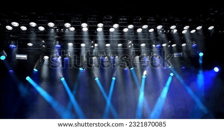 stage sceiling spotlights lighting the stage during the show or musical concert