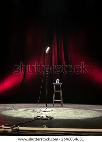 Stage with a single microphone and stool 