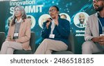 Stage, woman and presenter at seminar as event host, panel discussion or guest with microphone. Summit, public speaking and person with speech at conference for innovation in technology at workshop