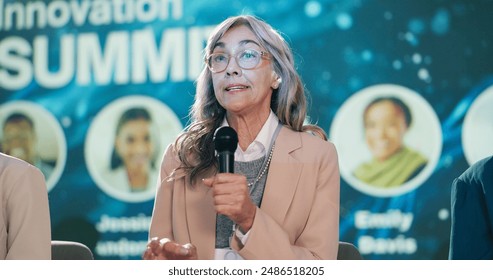 Stage, woman and speaker at convention as event host, panel discussion or guest with microphone. Summit, public speaking and person with speech at conference for innovation in climate change workshop - Powered by Shutterstock