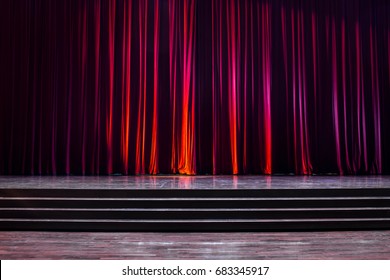 Stage Wood With Ladder And Red Curtains In A Theater.