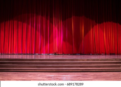 Stage Wood With Ladder And Red Curtains In A Theater.