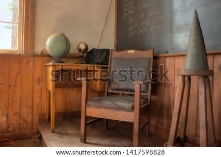A staged corner of an old classroom of a closed 1880's school.