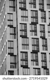 Staggered Geometric Pattern on Windows of a Condominium Building in Downtown Toronto (black and white)